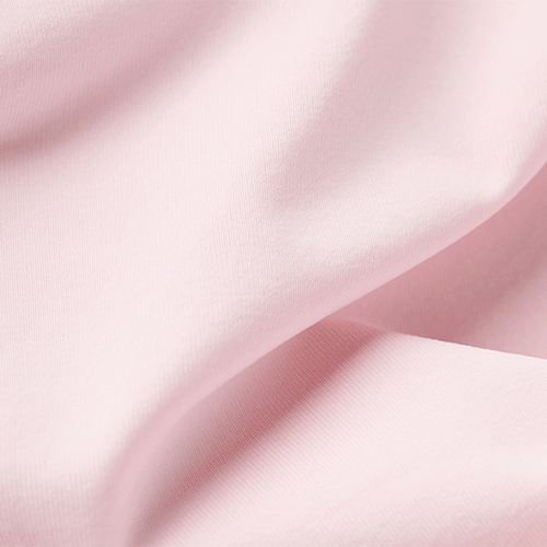 Close-up of pink fabric with a soft texture